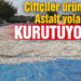 Çiftçiler ürünlerini asfalt yollarda kurutuyor