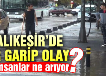 7 bin liralık telefonunu paçaları sıvayıp yağmur sularında aradı
