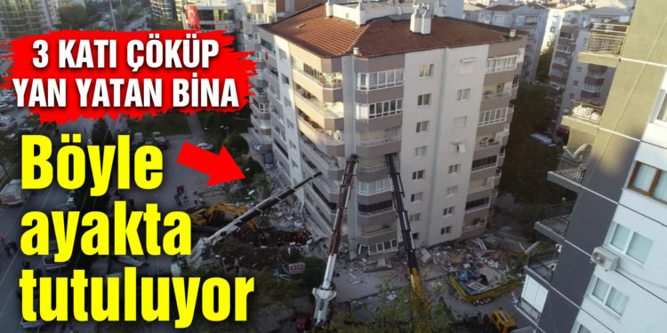 Depremde ilk 3 katı çöküp yan yatan bina, vinçlerle desteklendi