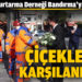 Çiçeklerle karşılandılar