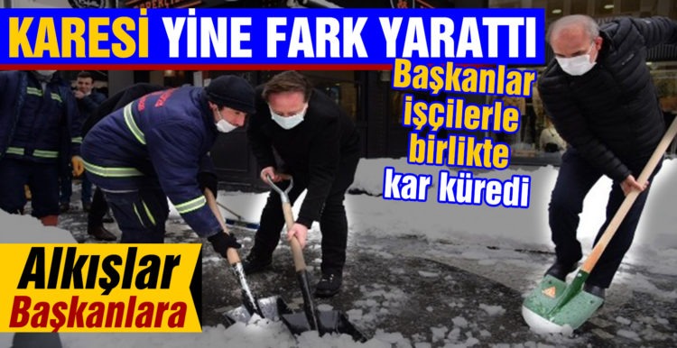 Karesi’de başkanlar işçilerle birlikte kar küredi
