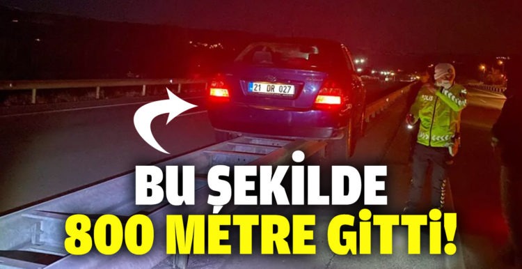 Bariyerlerin üzerine çıkan otomobil, devrilmeden 800 metre ilerledi