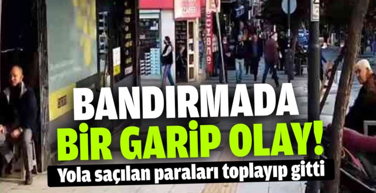 Yola saçılan paraları toplayıp gitti